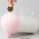 Illustration for article titled Rubber Swine Turns Anything Smashable Into a Piggy Bank